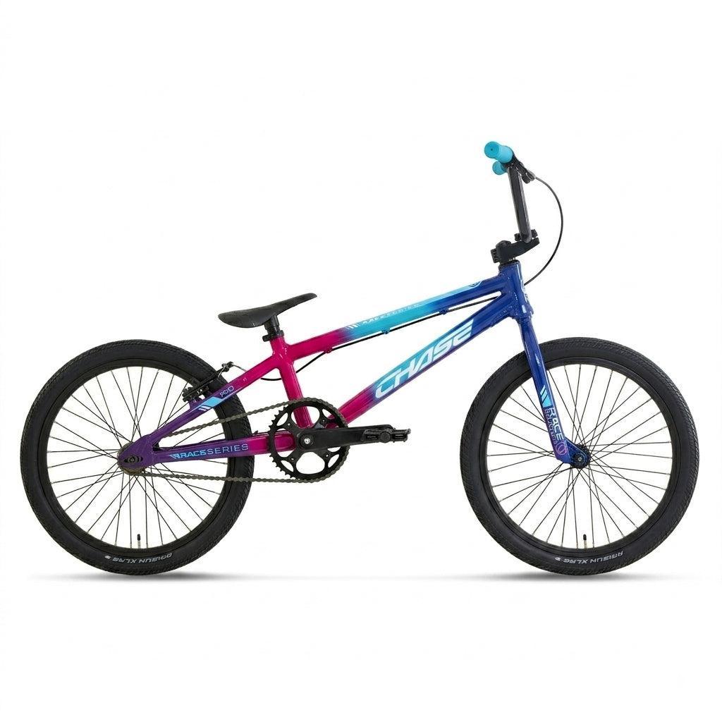 The Chase Race Series Pro Race Bike (2027) features a striking gradient blue to purple frame, complemented by black wheels, a black seat, and blue handlebar grips. Shown in a side view against a white background, this entry-level BMX race bike is perfect for those getting started in BMX racing.