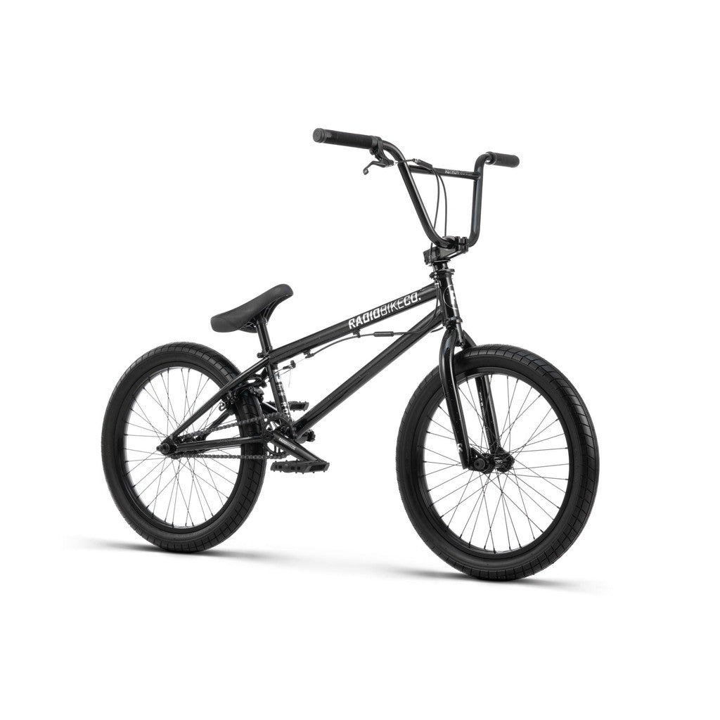 A black BMX bike with a full chromoly frame, wide tires, high handlebars, and a padded seat, designed for off-road and stunt riding. The brand name "Radio Astron FS 20 Inch Bike" is visible on the frame.
