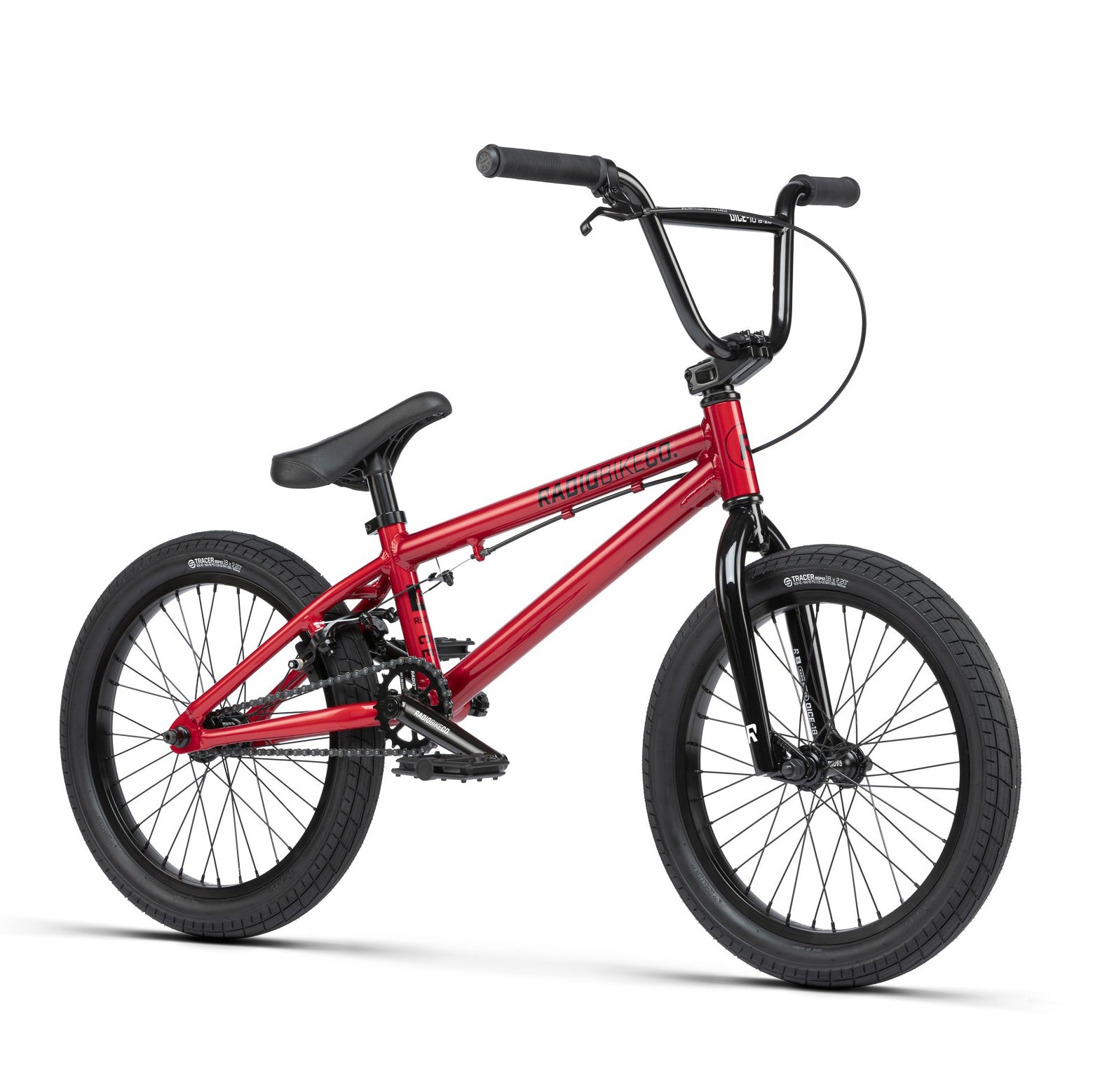 A red Radio Dice 18 Inch Bike with black handlebars, seat, and Salt Tracer Tyres, viewed from an angle, showcasing its frame and components.