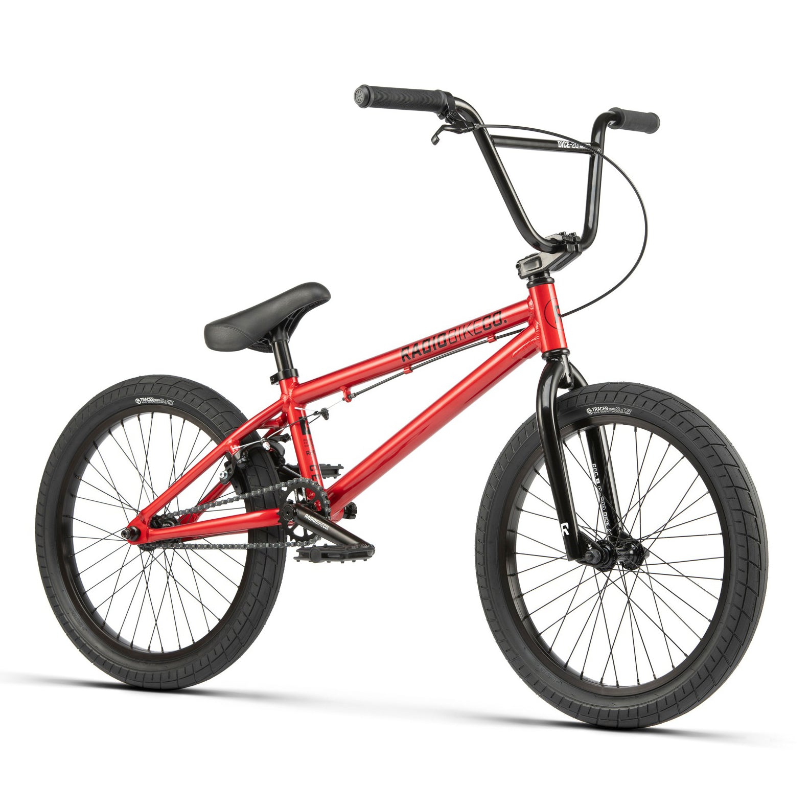 Description: Red BMX bicycle with a black seat, black handlebars, and Salt Tracer Tyres. The minimalist Radio Dice 20 Inch Bike comes equipped with front and back pegs for performing tricks.