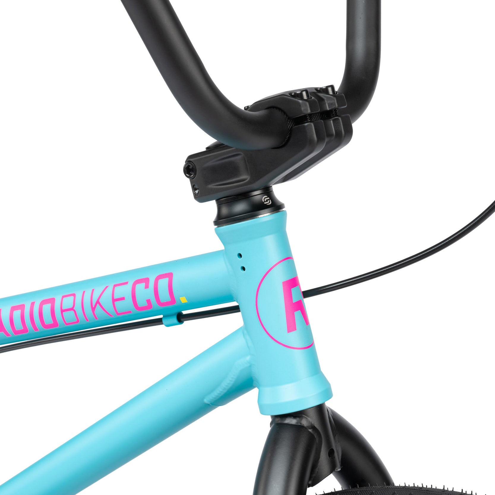 Close-up of a blue bicycle frame with a black handlebar and prominent pink branding, showcasing the Radio Evol 20 Inch Bike designed with high-quality parts for beginner riders.