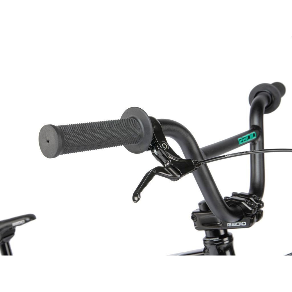 A black Radio Xenon Expert BMX bike with handlebars.