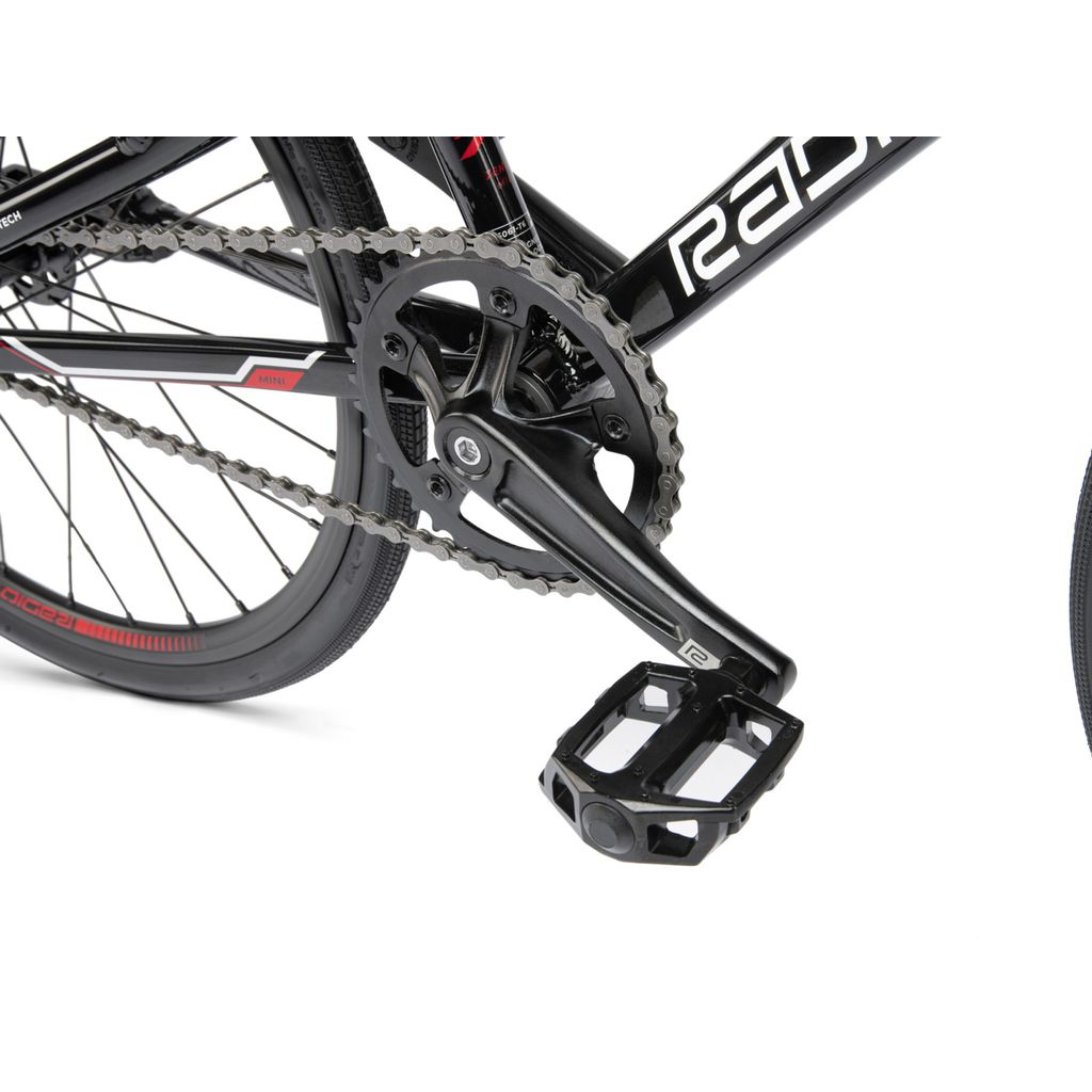 A Radio Xenon Mini Bike with a chain and pedals on a white background.