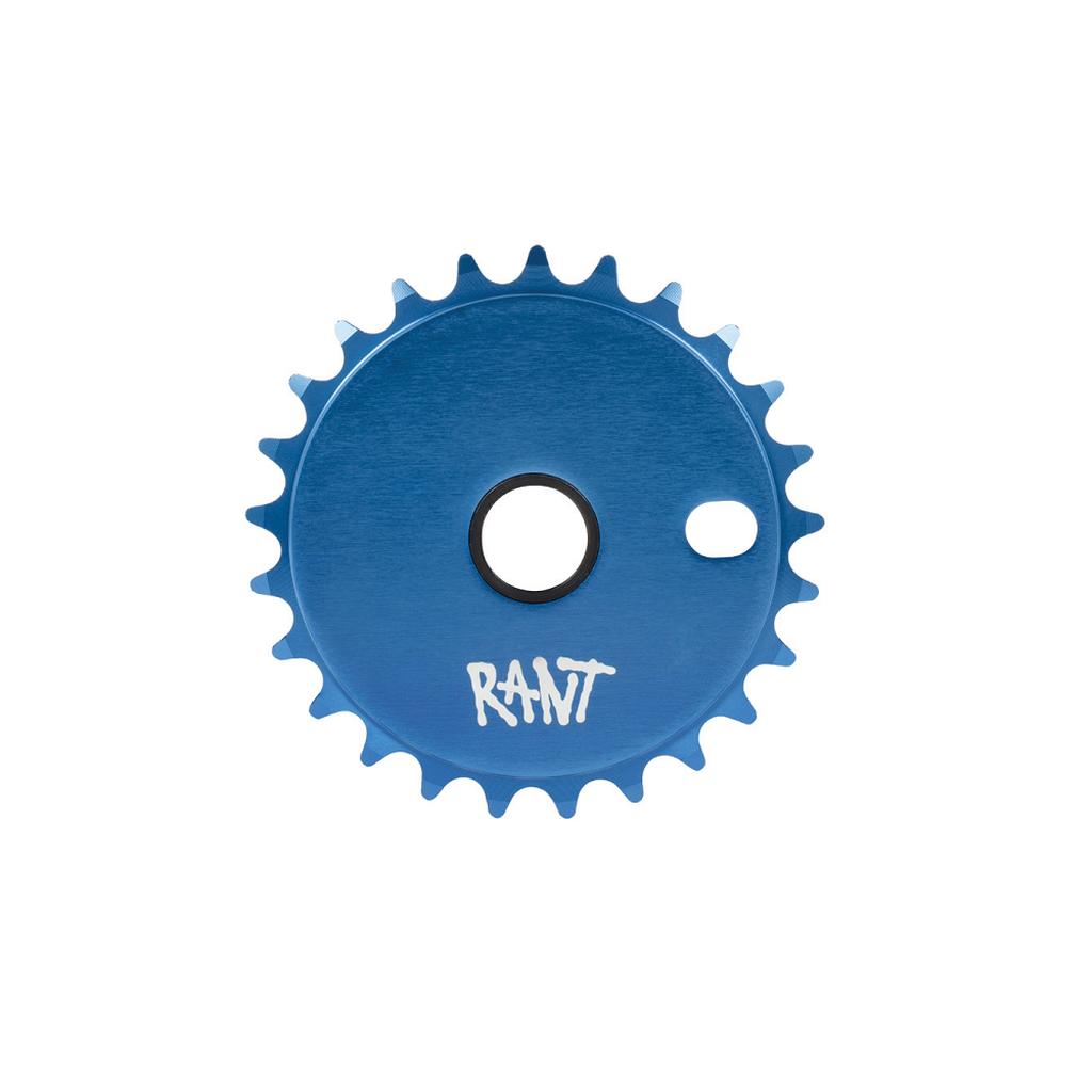 The Rant Stick Em Sprocket is a blue bicycle sprocket with "RANT" printed in white, featuring a central hole and 25 teeth around the edge.