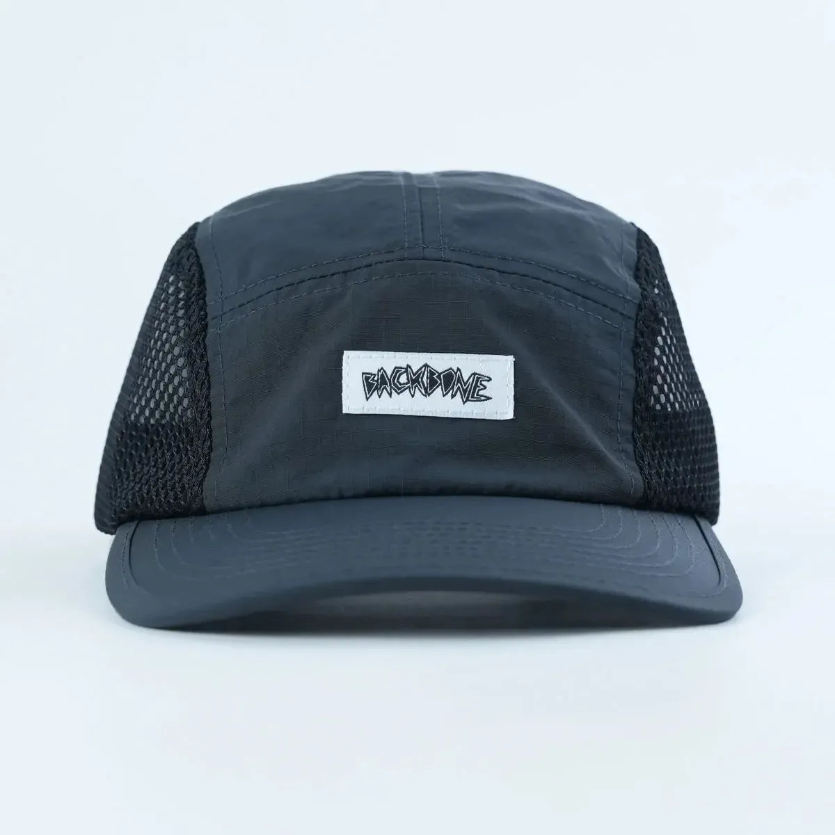 The Backbone Ride Club Hat is a black mesh trucker hat with a flat brim and a front patch featuring the word “BACKBONE” in a stylized font—perfect for adding bold style to your BMX ride.