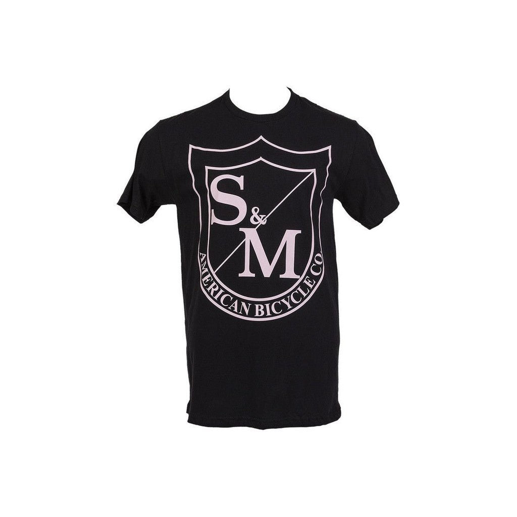 The S&M Big Shield T-Shirt features a large "S&M" shield emblem with "American Bicycle Co" on the front and is made from soft combed ring-spun cotton for comfort.
