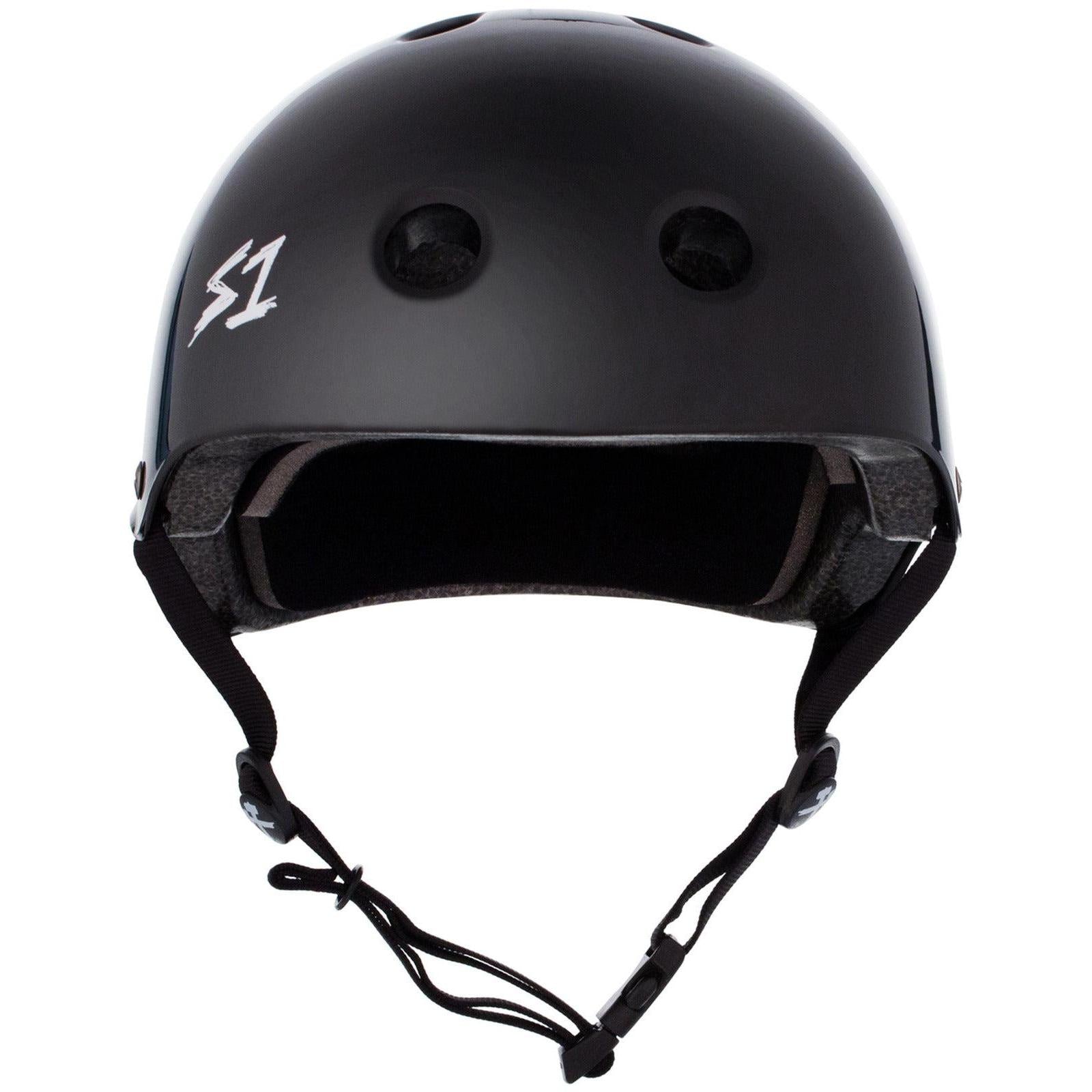 The Australian-certified S-One Helmet Lifer Black Gloss is a black protective headgear featuring ventilation holes and an adjustable chin strap. It sports a white "S1" logo on the front left, ensuring both safety and style.