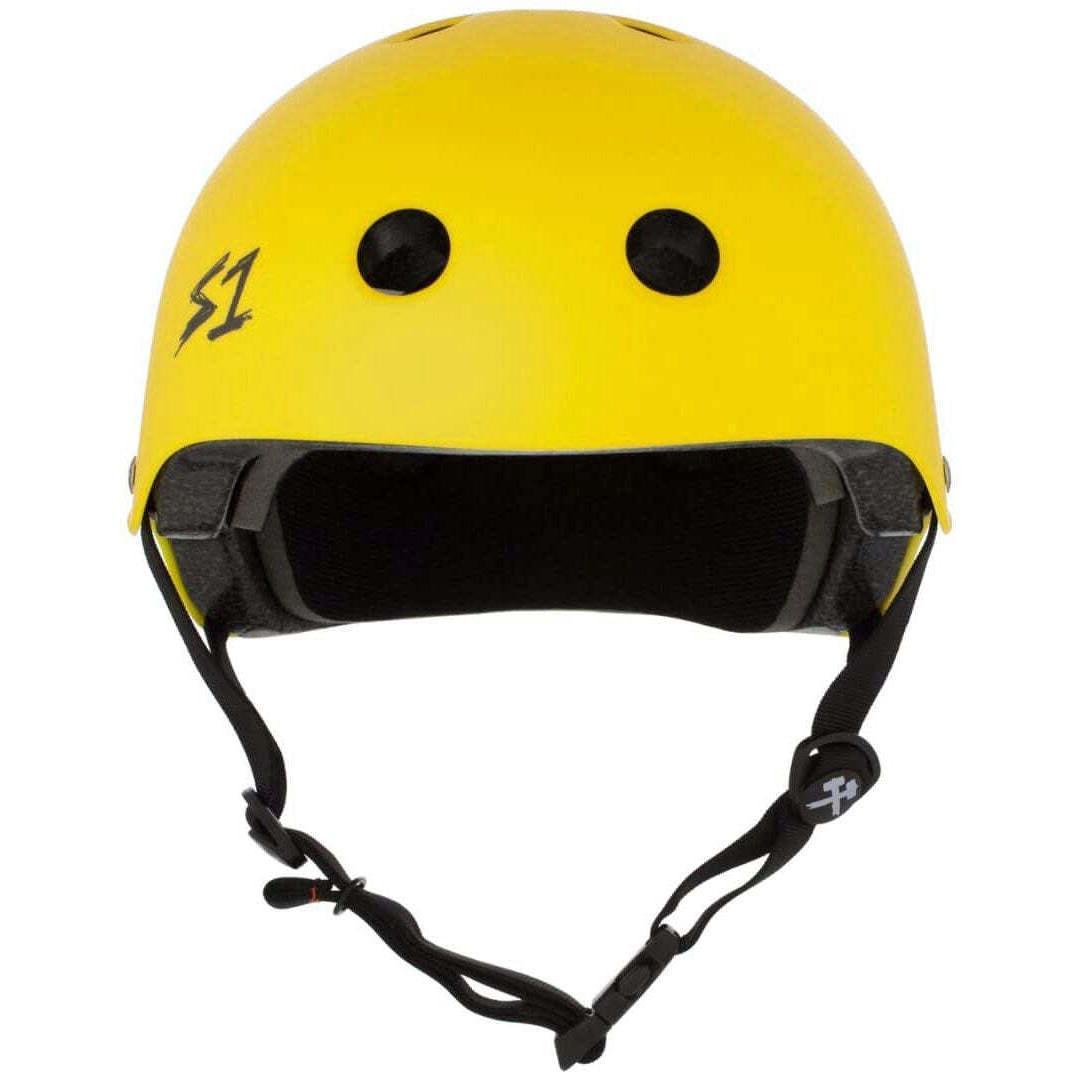 The S-One Helmet Lifer in Yellow Matte showcases a black interior padding along with an adjustable chin strap. It includes ventilation holes and a discreet black "S1" logo on the side, while its EPS Fusion Foam delivers certified multiple impact protection to ensure your safety.