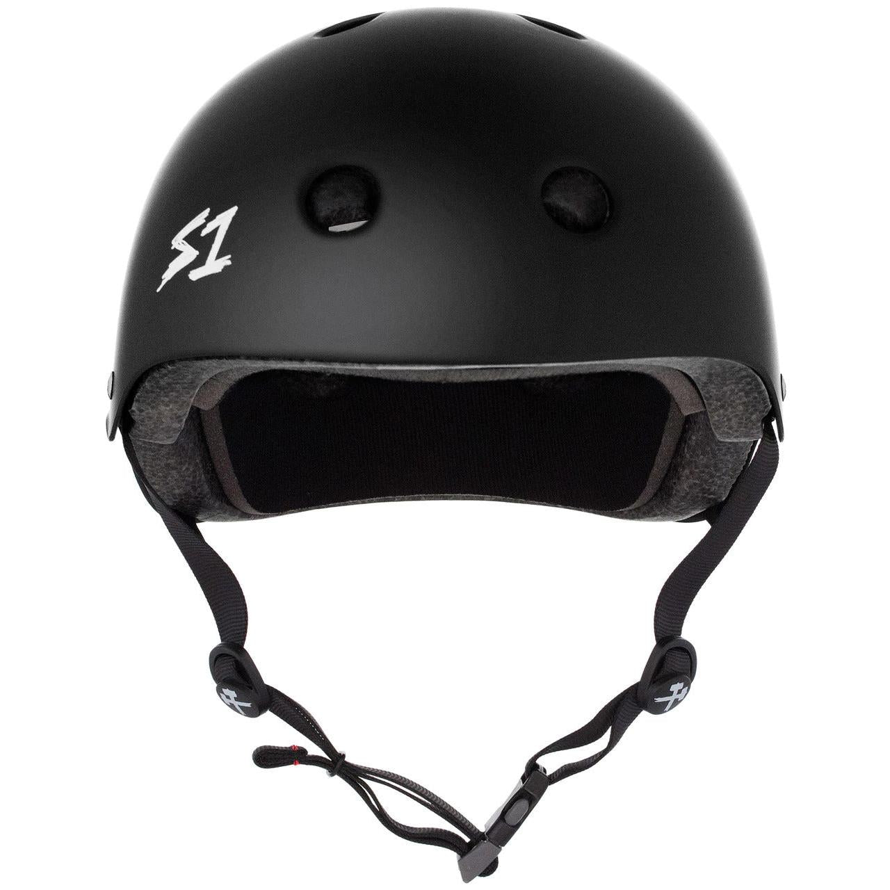 A black S-One Helmet Mega Lifer Black Matte labeled "S1" with an adjustable chin strap and ventilation holes on the top, this high-impact helmet is a multi-impact Australian-certified helmet.