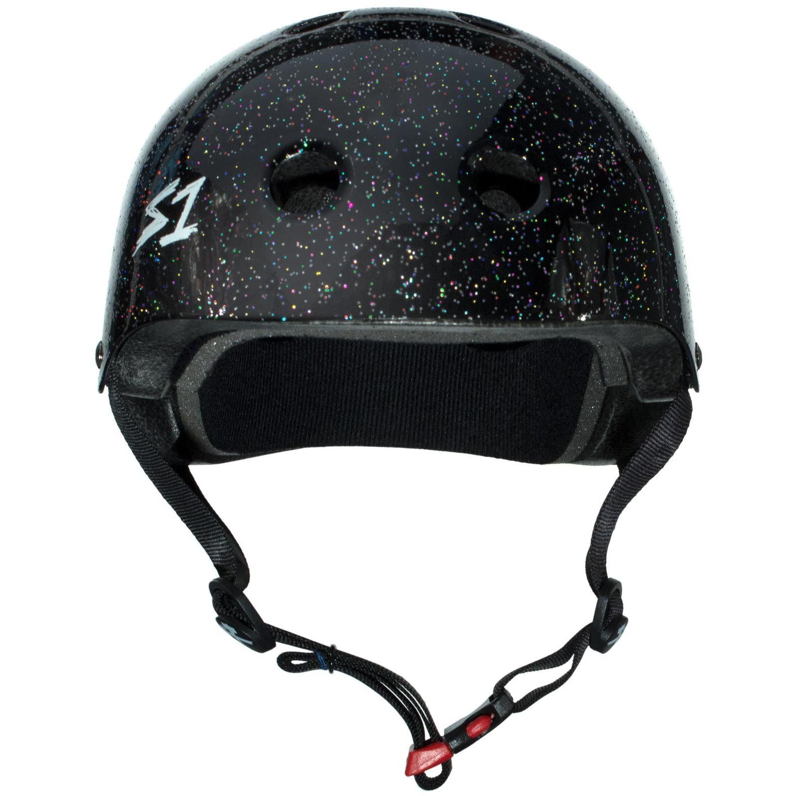 A black S-One Helmet Mini Lifer Black Gloss Glitter helmet with a textured speckled design and a white "S1" logo on the side. It features air vents, adjustable chin straps, and durable EPS Fusion Foam for multi-impact protection.