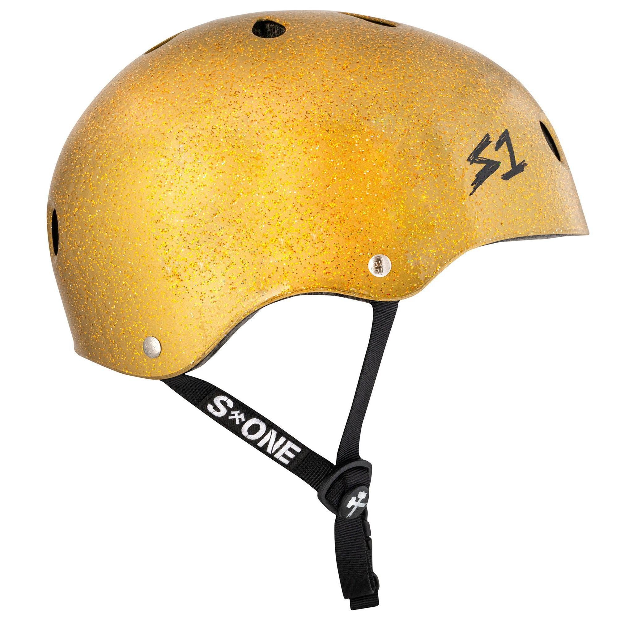 A yellow, glittery, hard-shell helmet with black adjustable straps and multiple ventilation holes. The S-One Helmet Mini Lifer Gold Gloss Glitter has "S1" printed on the side and features EPS Fusion Foam for enhanced protection as a multi-impact helmet.