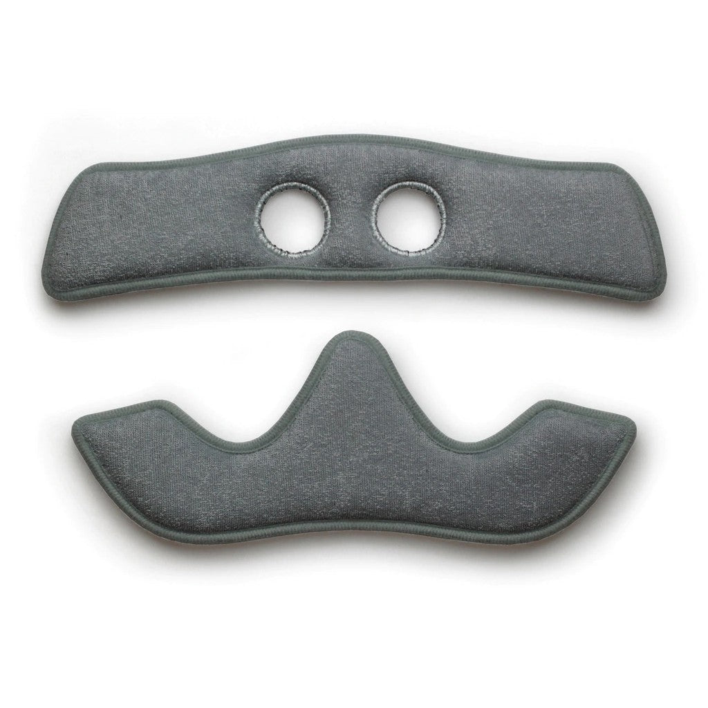 Two grey cushioned pads, one with two circular openings and the other contoured with a wave-like shape, likely for ergonomic support or padding. These pads function as washable sweat absorbing liners, ensuring comfort and hygiene. These pads are the S-One Helmet Wide Terry Cloth Liner.