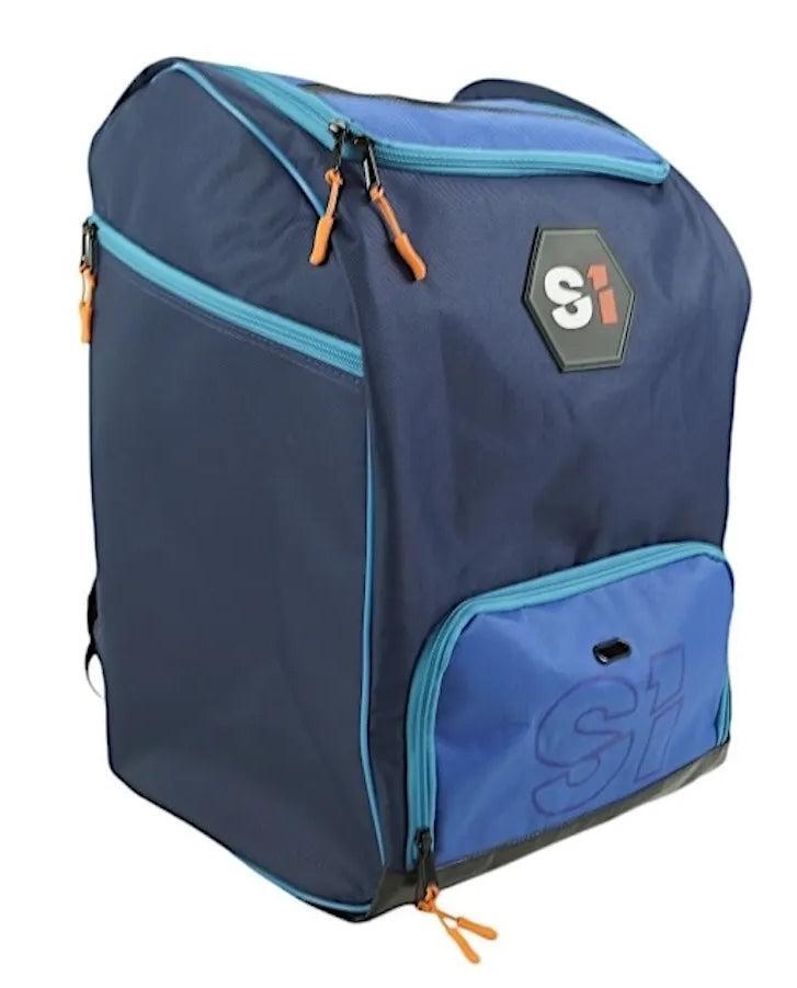 The S1 Helmet / Gear Backpack is a large blue bag with light blue zippers, orange pulls, and a front pocket featuring the “SI” logo in black, white, and orange—ideal for carrying racing gear in style.