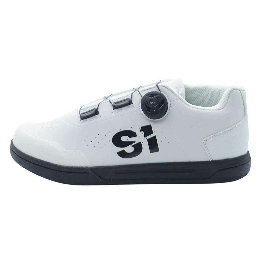 The S1 Accel Race Shoes are white athletic BMX shoes with a black STKgrip rubber sole, bold black "S1" on the side, and a dial closure system on the upper.