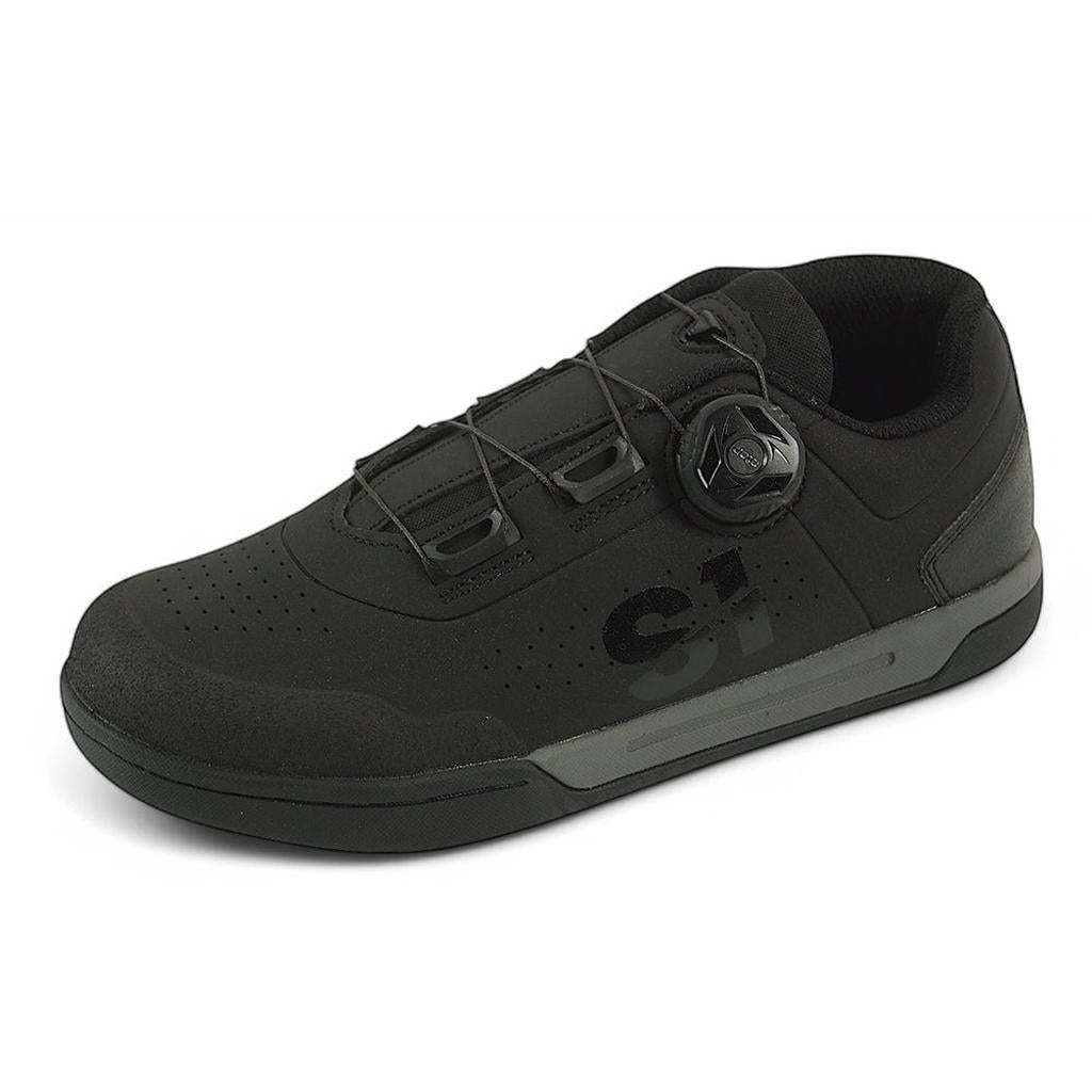 The S1 Accel Race Shoes are black BMX shoes featuring a reinforced toe, BOA-style dial closure, perforated detailing, and ultimate grip for impact resistance—displayed against a white background.