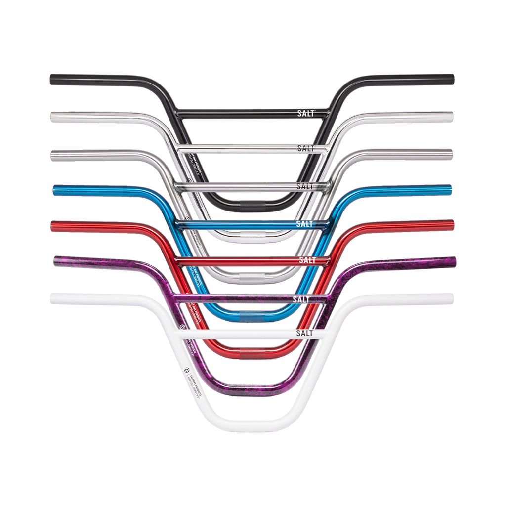 A vibrant array of BMX handlebars, featuring Chromoly and Salt Pro Bars, are arranged in a vertical stack.