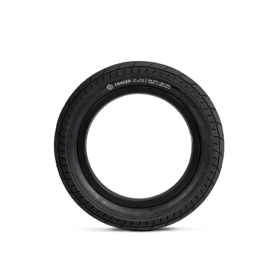 A black Salt Tracer Tyre on a white background, with excellent traction.