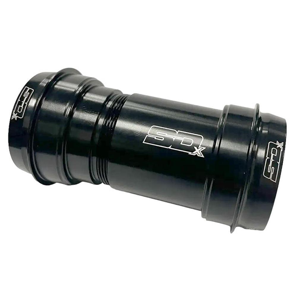 A black cylindrical SD BB30 Spinning Ceramic Bottom Bracket 24mm with “SDx” and “C-Bear” logos printed in white on its surface.