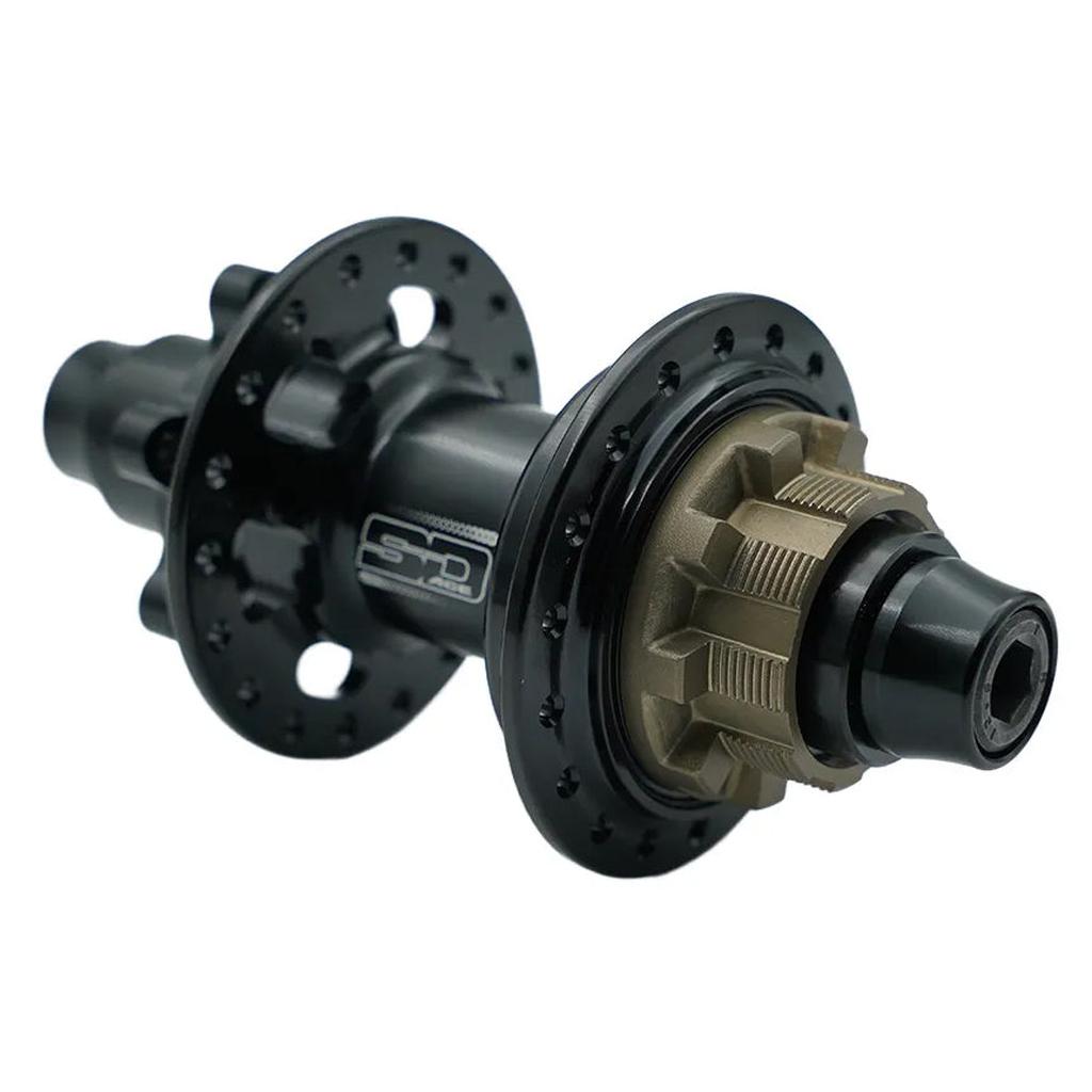 Close-up view of the SD Ace V2 Rear 10mm Disk Hub, featuring a black and bronze finish, multiple spoke holes, and an aluminum freehub body, designed for use with carbon race wheels.