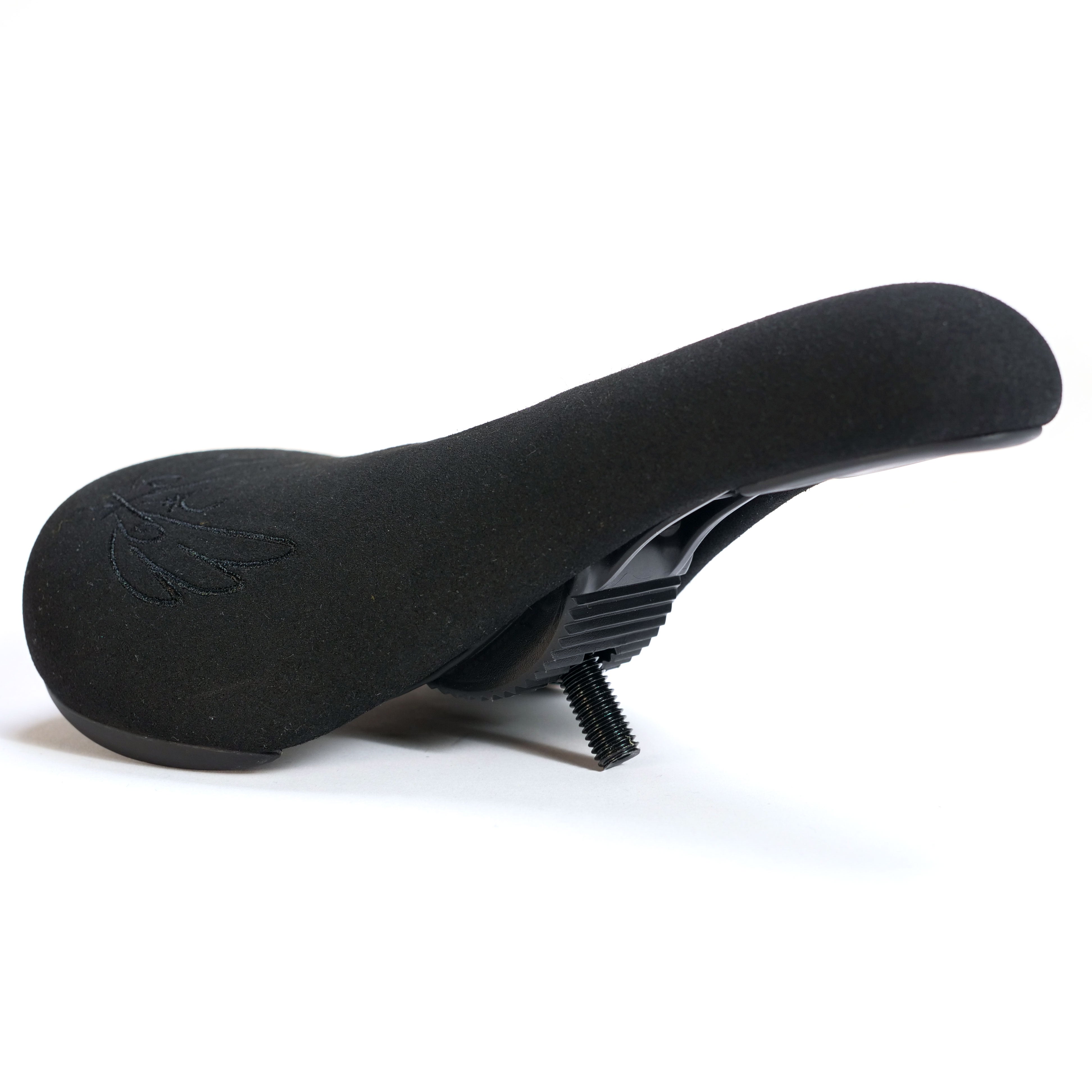 Colony Sigil Pivotal Seat (Sean Gardner Signature) in black, features a sleek, ergonomic design with side profile shown on white. Includes bottom bolt for attachment—ideal as a pivotal seat and standout BMX upgrade.