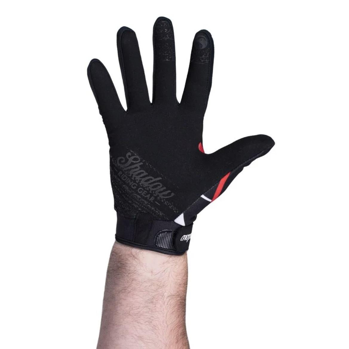 A man's Shadow Conspire Gloves with a strong grip.