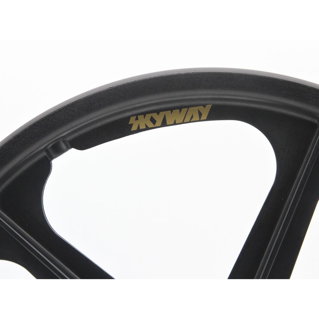 Close-up of a Skyway TUFF II 60th Anniversary Graphite Edition 20 Inch Wheel with gold "SKYWAY" branding, celebrating six decades of iconic BMX wheels, displayed against a white background.