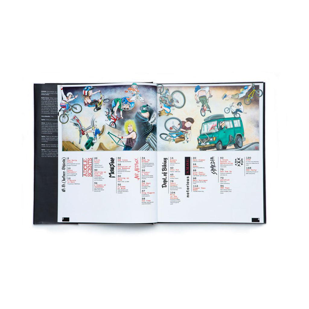 A book featuring a mesmerizing picture of a biker riding the S&M Behind The Shield Book.