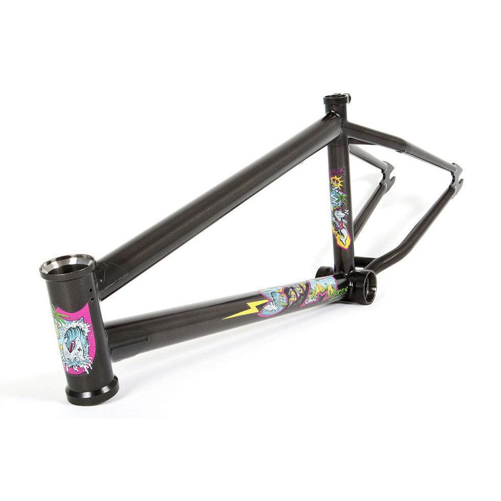 The S&M Hucker Frame (Mike Hucker Signature) features a matte black chromoly build with colorful graphic decals on the head tube, down tube, and bottom bracket area.