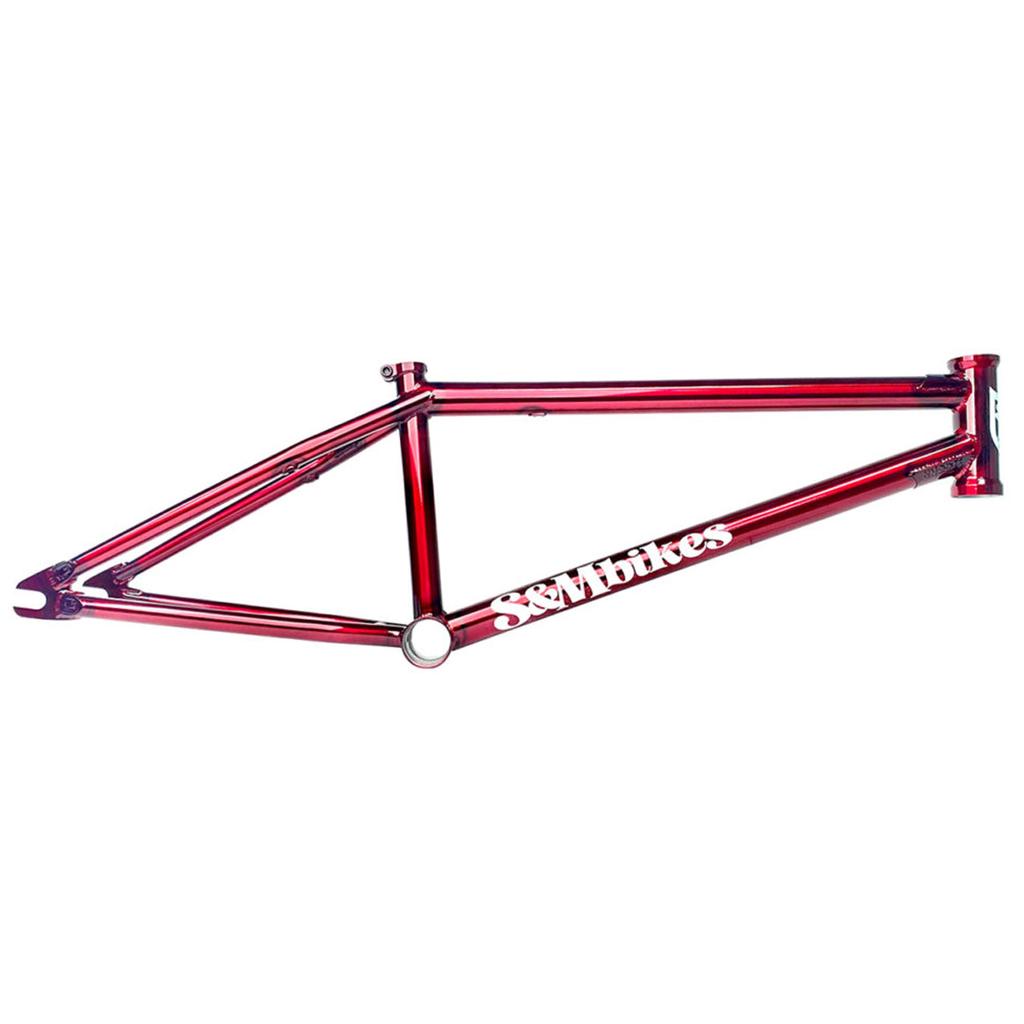 The S&M Whammo V2 (Craig Passero) Frame features a red design with the "S&M Bikes" logo, showcasing simple, sleek aesthetics with visible welds and optimized sprocket clearance for improved performance.