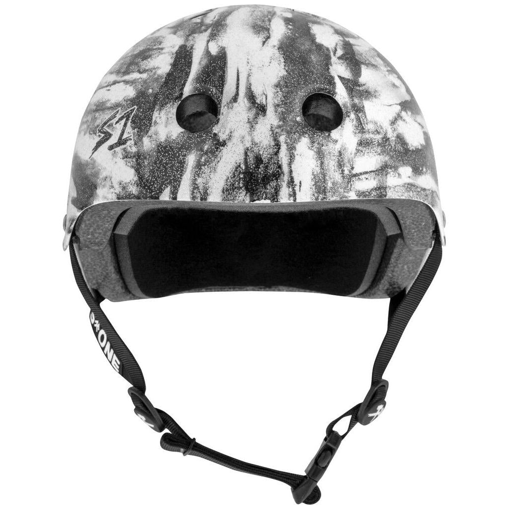 Front view of the S-One Lifer Helmet in Black White Glitter/Bomba Hache, a certified skate helmet featuring ventilation holes, foam interior, multiple impact protection, and an adjustable chin strap.