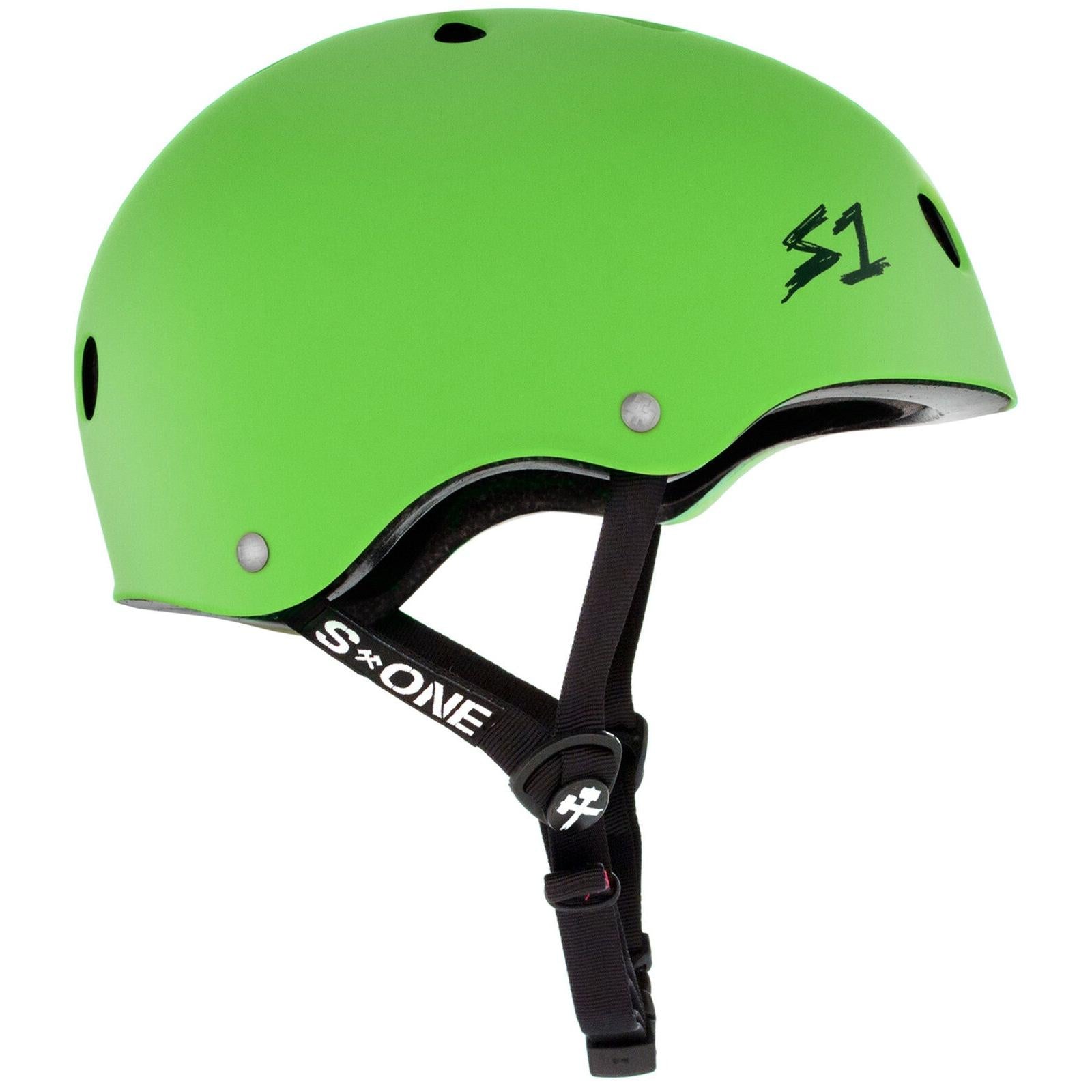 The S-One Lifer Helmet in Bright Green Matte is a certified skate helmet featuring black adjustable straps and ventilation holes, shown from a side angle for superior head protection.