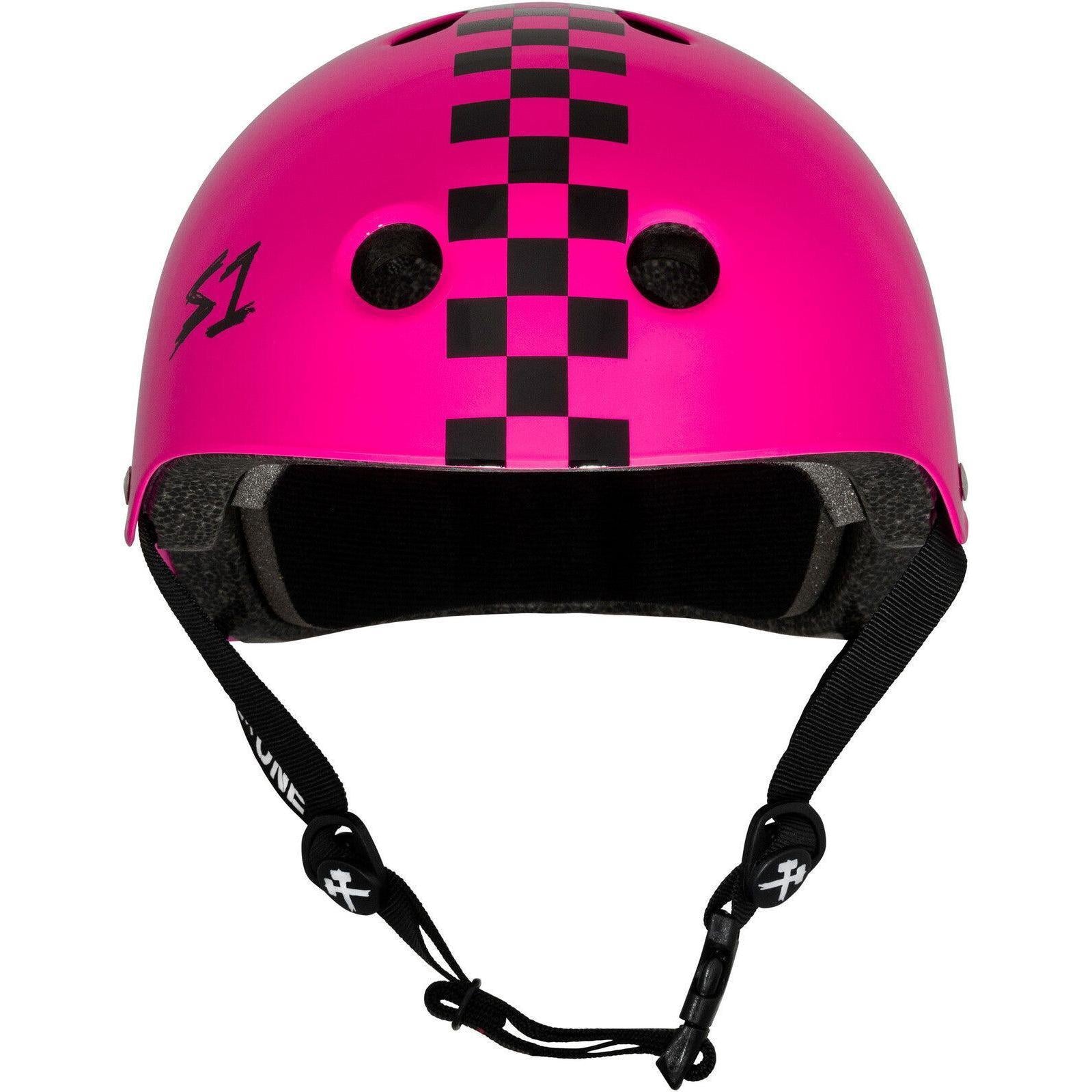 The S-One Lifer Helmet in Pink Gloss/Black Checkers is a certified skate helmet with ventilation holes, adjustable black chin straps, and multi-impact protection.