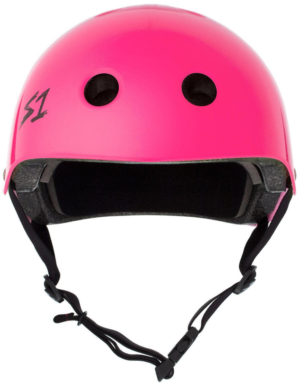 The S-One Lifer Helmet in Hot Pink Gloss features black vents, a front "S1" logo, multi-impact protection, and an adjustable chin strap—your certified skate helmet for style and safety.