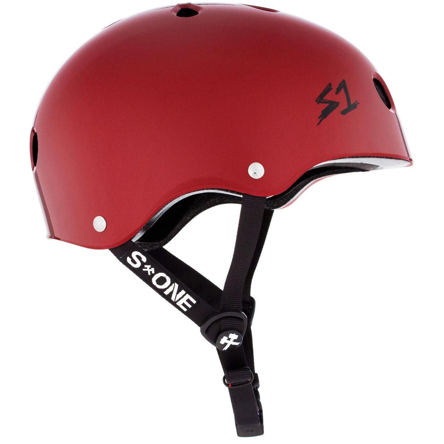 The S-One Lifer Helmet in Blood Red Gloss features ventilation holes, a black adjustable chin strap, and is designed for multiple impact protection.