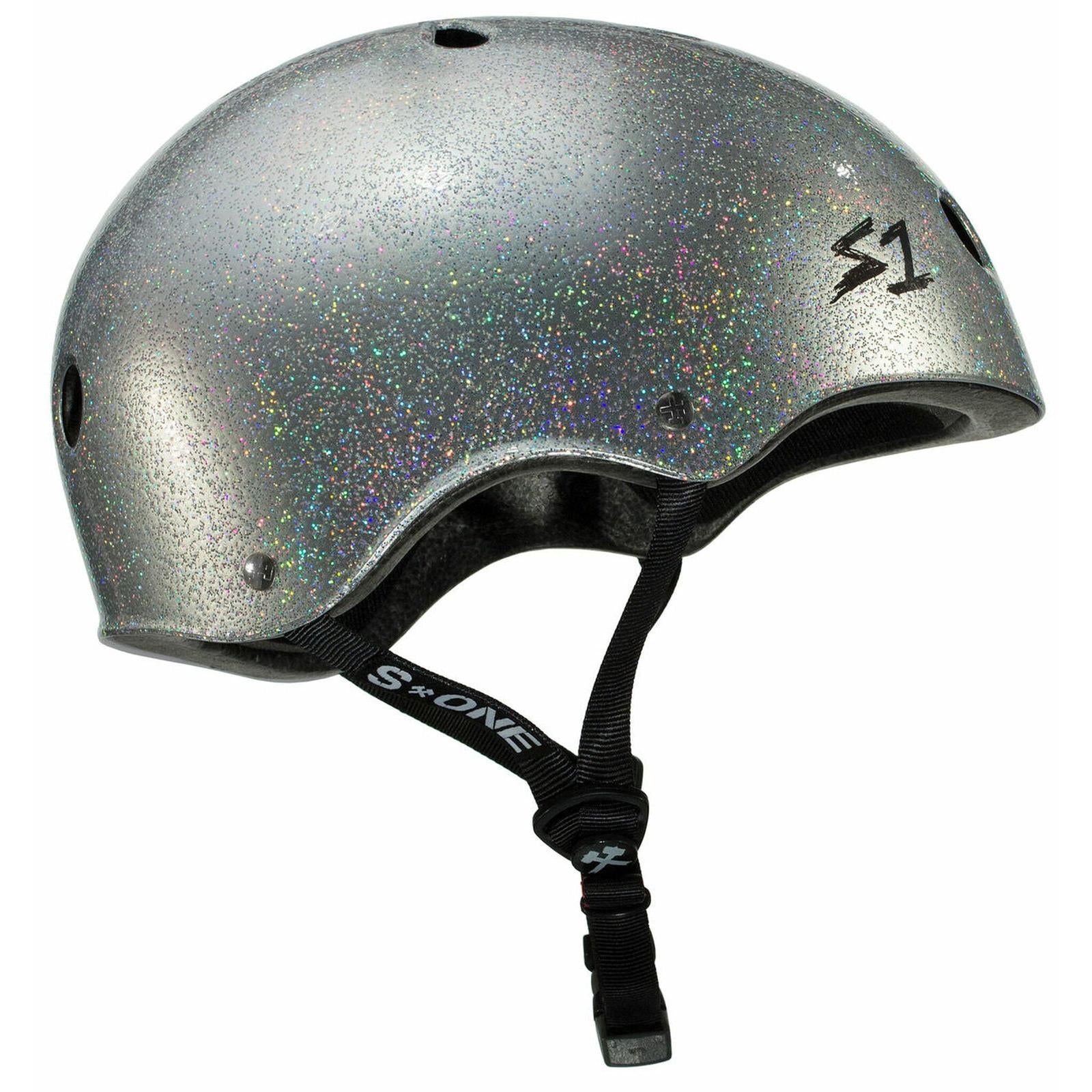 The S-One Helmet Mega Lifer in Silver Glitter features EPS Fusion Foam for multiple impact protection, a black adjustable chin strap, ventilation holes, and the S1 logo on the side.