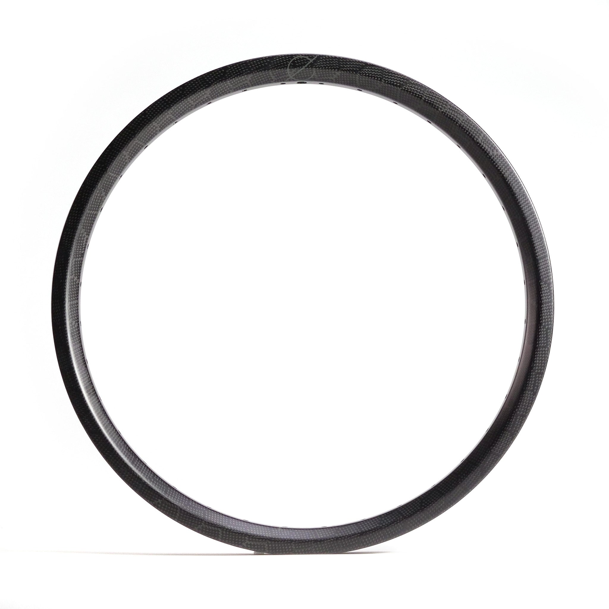 The Spectre NME Carbon Fiber 20 Inch Brakeless Rim, shown in black, is displayed against a plain white background.