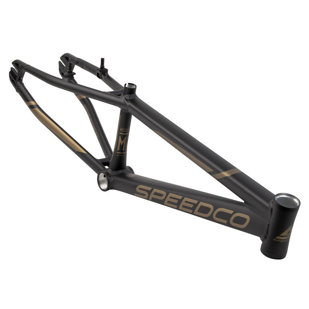 The Speedco M2 Expert Cruiser Frame in matte black with gold accents is crafted from high-quality aluminium and designed for V-brake compatibility, shown angled to highlight the top tube, rear triangle, and head tube.