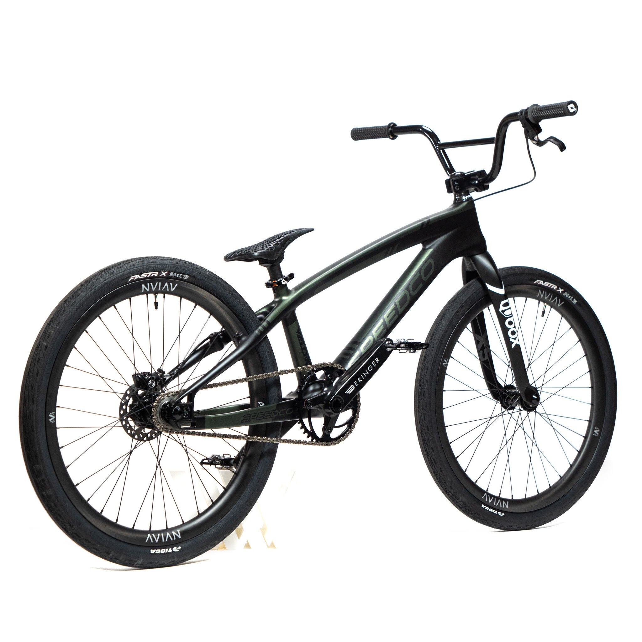 This contemporary BMX bike, the Speedco Velox Pro XL Cruiser Custom Bike, features a stylish black frame, large tires, and elevated handlebars. It is engineered for off-road and stunt cycling, offering speed and performance across various terrains.