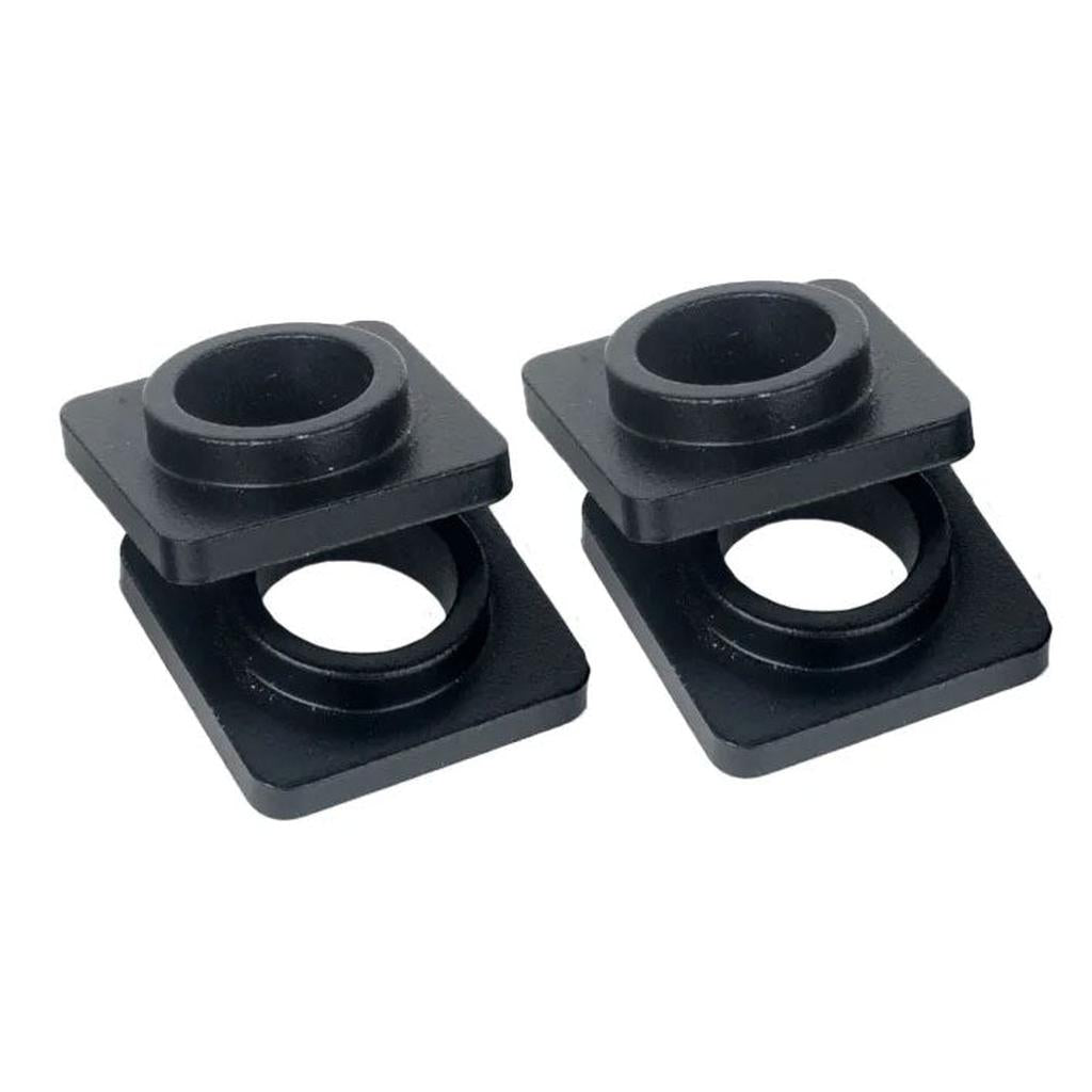 Two black rectangular plastic adapters, each featuring a round raised opening on top and a corresponding hole on the bottom, are displayed side by side against a white background. These components are Speedco M2 Dropout Adapters, designed as replacement parts compatible with Speedco M2 dropout blocks.