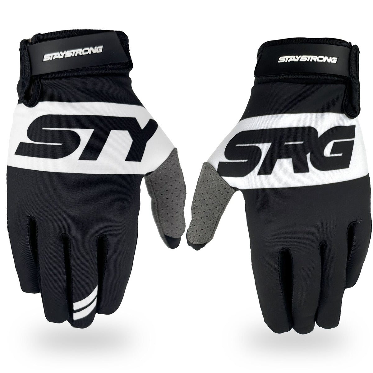 A pair of Staystrong Glove Classic Black BMX gloves in black and white, featuring “STY” on the left glove and “SRG” on the right glove, crafted from premium quality materials with “STAYSTRONG” branding on the adjustable wrist straps.