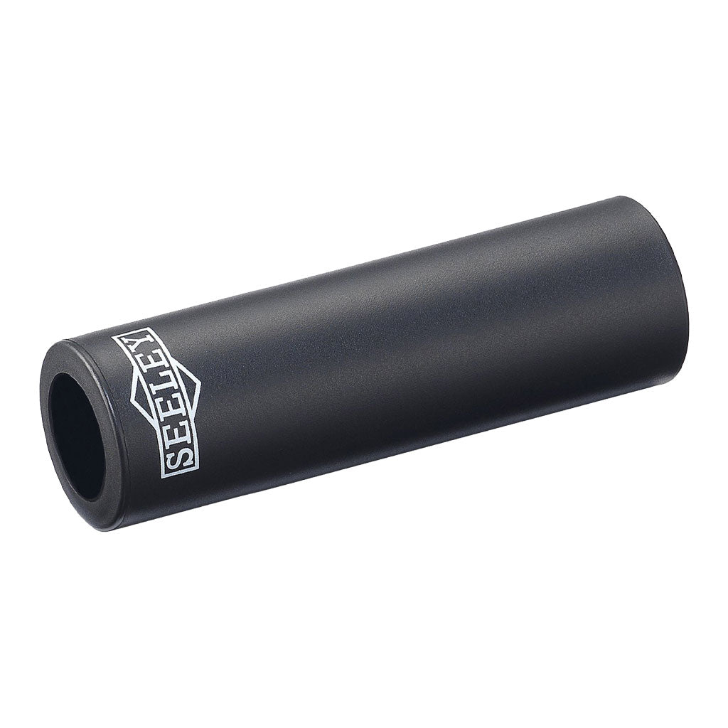 A black tube with a logo on it, featuring the Sunday Seeley Axle Peg Sleeve keyword.