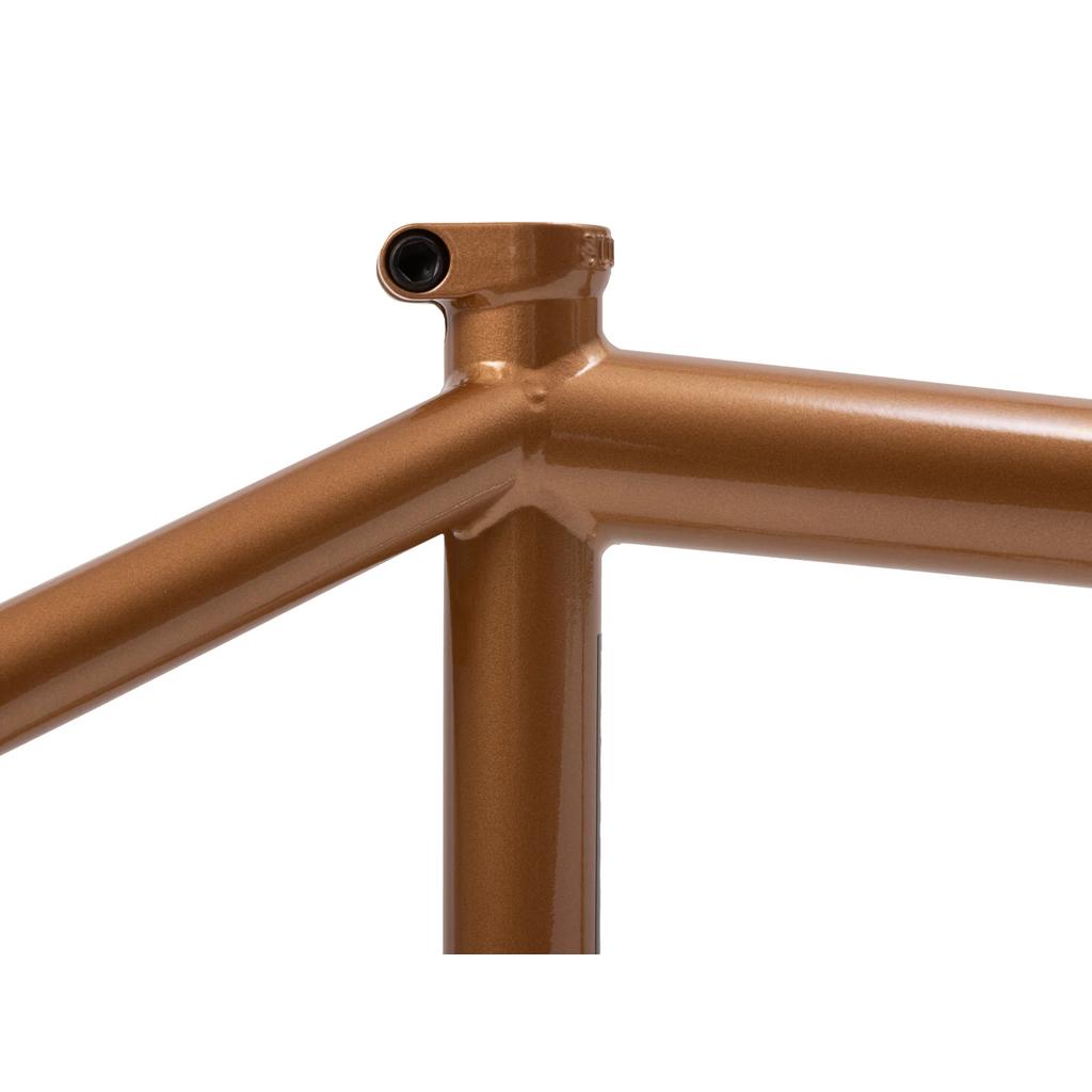 Close-up of the Sunday Silvawave Frame (Brett Silva Signature) in metallic brown, highlighting the top tube, seat tube, and seatpost clamp area.