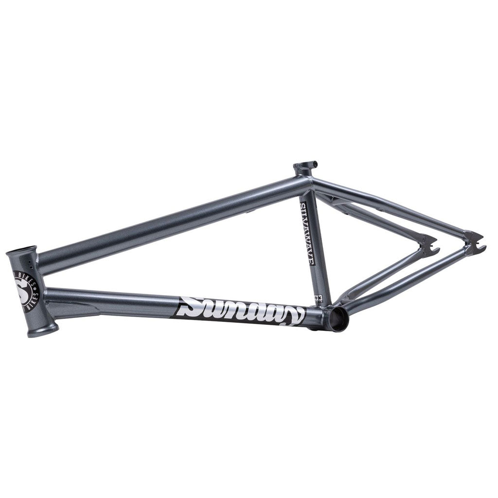 The Sunday Silvawave Frame, endorsed by Brett Silva, features a side angle view with "Sunday" and "Broadcaster" logos, and is made from 100% 4130 chromoly in a sleek gray finish.