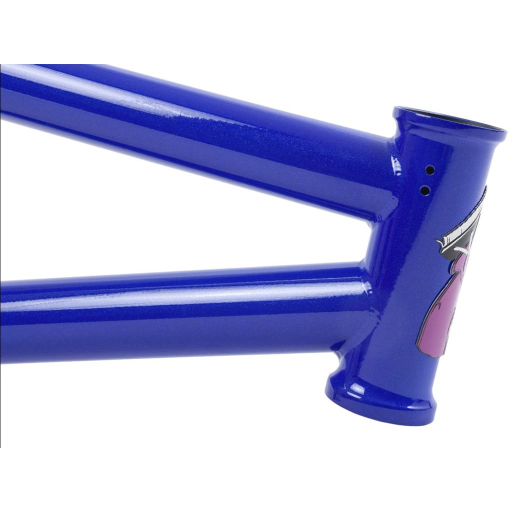 Close-up of the Sunday Street Sweeper Frame (Jake Seeley Signature), a blue BMX made from 4130 Chromoly, featuring a logo with a pink and silver design.