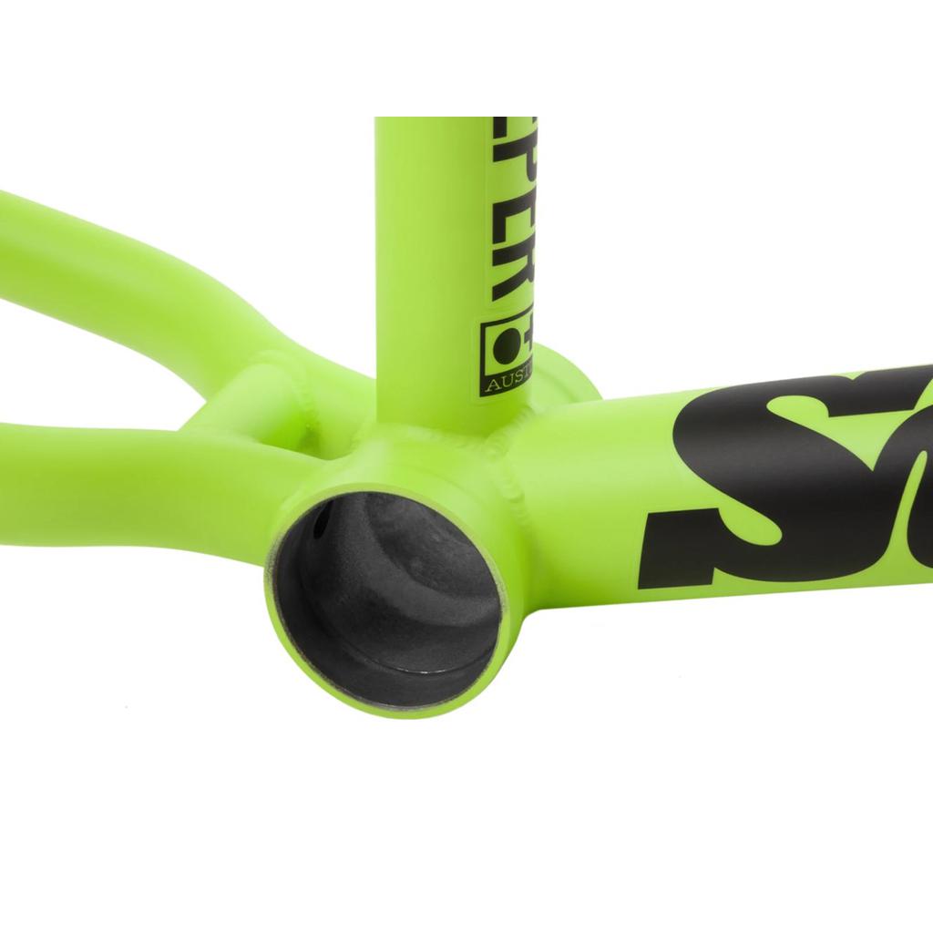 Close-up of a neon green Sunday Street Sweeper Frame's bottom bracket, highlighting part of the brand name in bold black lettering, embodying the sleek design favored by Jake Seeley.