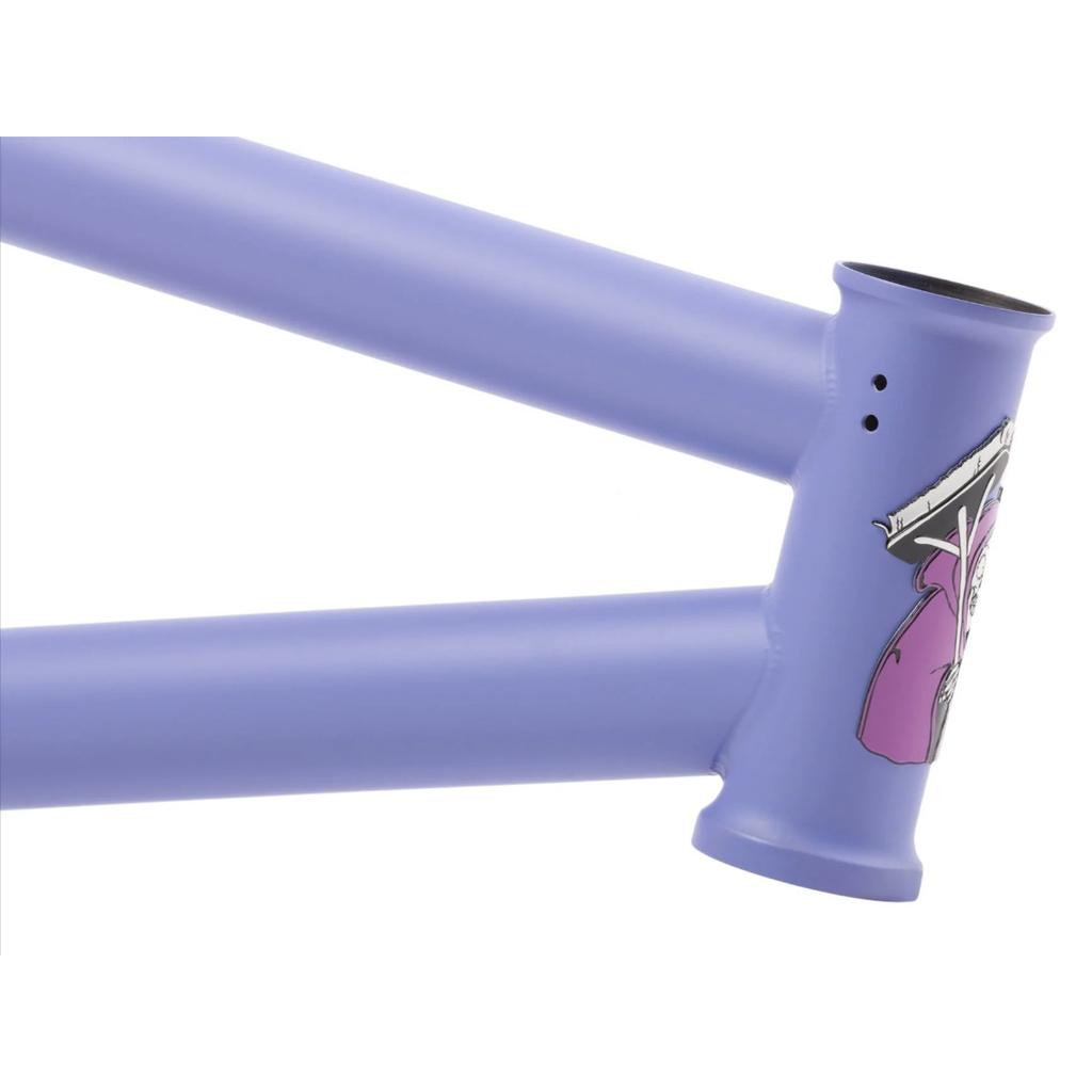 Close-up of a purple Sunday Street Sweeper Frame (Jake Seeley Signature) made from 4130 Chromoly, featuring graphic design near the head tube in signature style.