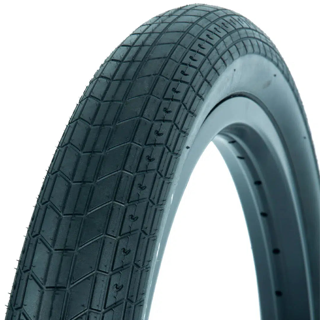 Close-up image of a single Tall Order Reilly Park Tyre with a textured tread pattern, displayed against a white background.