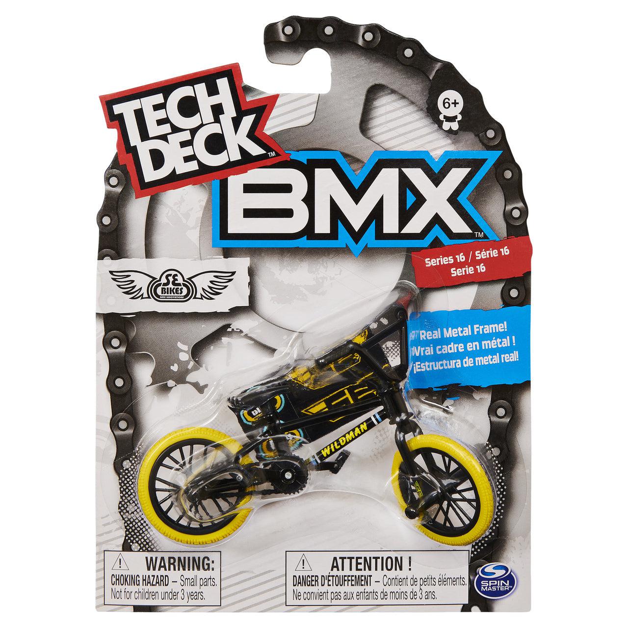The Tech Deck BMX Bike (Assorted Models, Sold Individually) is presented in packaging with a black and yellow design and includes a choking hazard warning for children under 3 years.