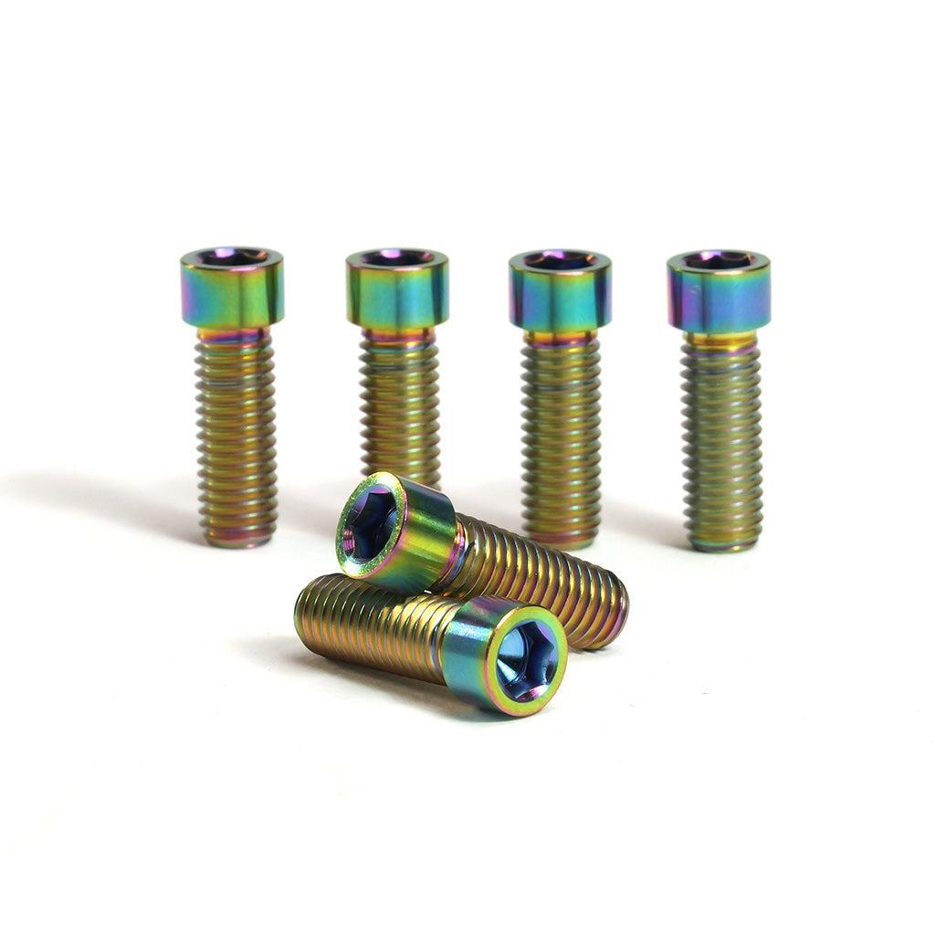 Six Titanium M8 Low Head Stem Bolts are displayed on a white background, with three standing upright and three lying down in the foreground.