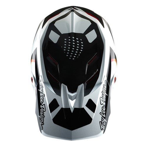 The TLD 25.1 D4 Carbon Helmet (MIPS) in Optic Black, with a geometric design and "Troy Lee Designs" on the sides, is shown from above—ideal for downhill BMX adventures.
